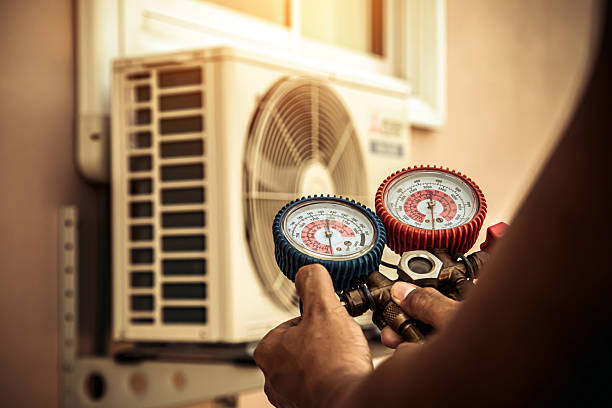 Professional Hvac technician working in Manakin Sabot, VA